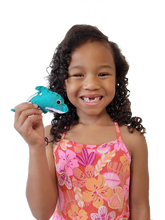 Load image into Gallery viewer, Little girl holding sewn teal dolphin