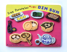 Load image into Gallery viewer, Yelllow and pink dim sum puzzle reading "tiny treasures dim sum" with all pieces in place
