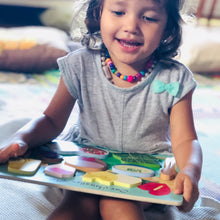Load image into Gallery viewer, Girl holding Hawaiian plate food puzzle Keiki Kaukau
