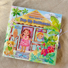 Load image into Gallery viewer, Book reading "'Hale Laule‘a' Pop-Up Doll House" with illustrations of a little girl, boy, and dog in front of a house