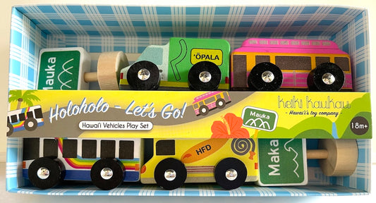 Four wooden cars (garbage truck, trolly, bus, and fire truck) with two street signs in a blue and white palaka box with label reading "Holoholo- Let's Go! Hawai'i Vehicles Play Set"